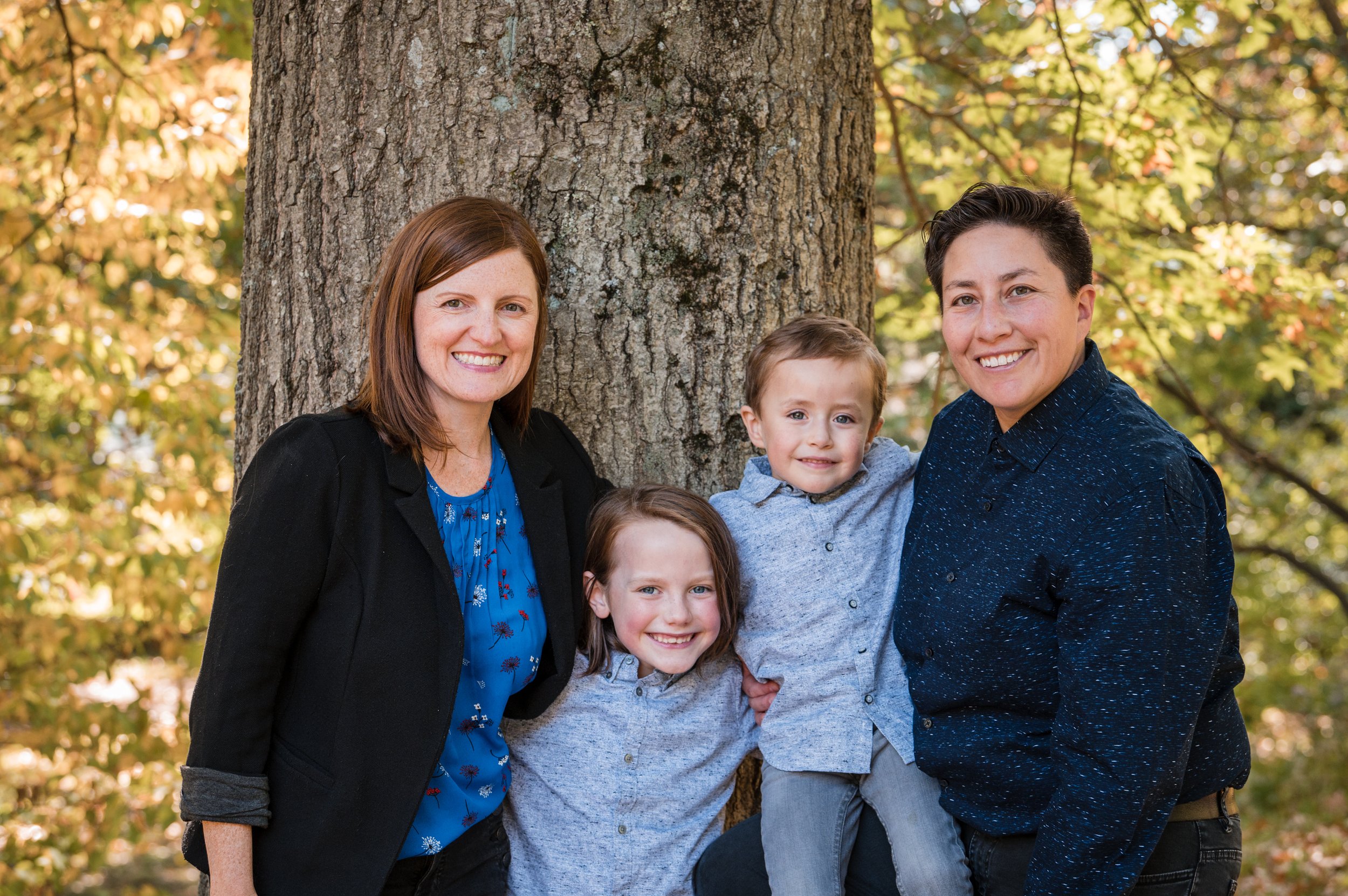 Queer family photo with two kids in new england fall weather by Michelle Schapiro Family Portrait Photographer