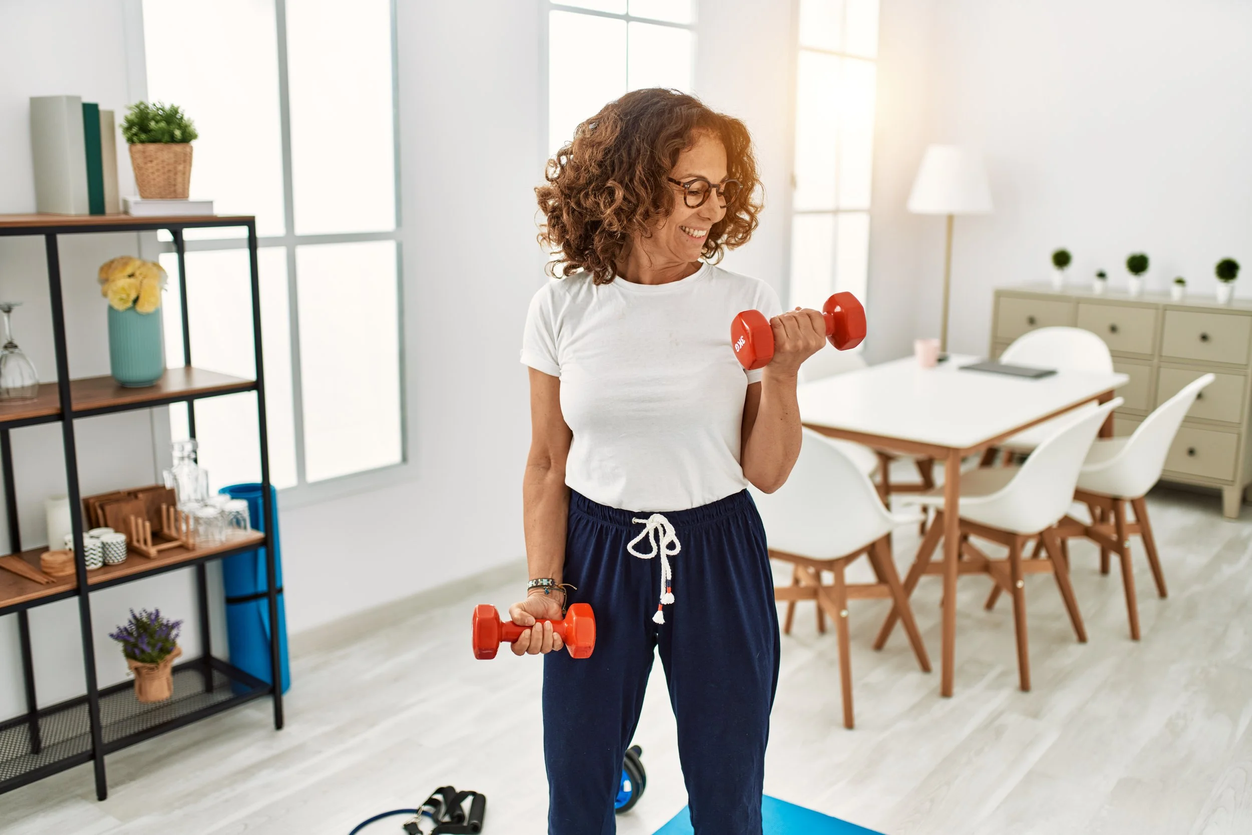woman with hand weights.jpeg