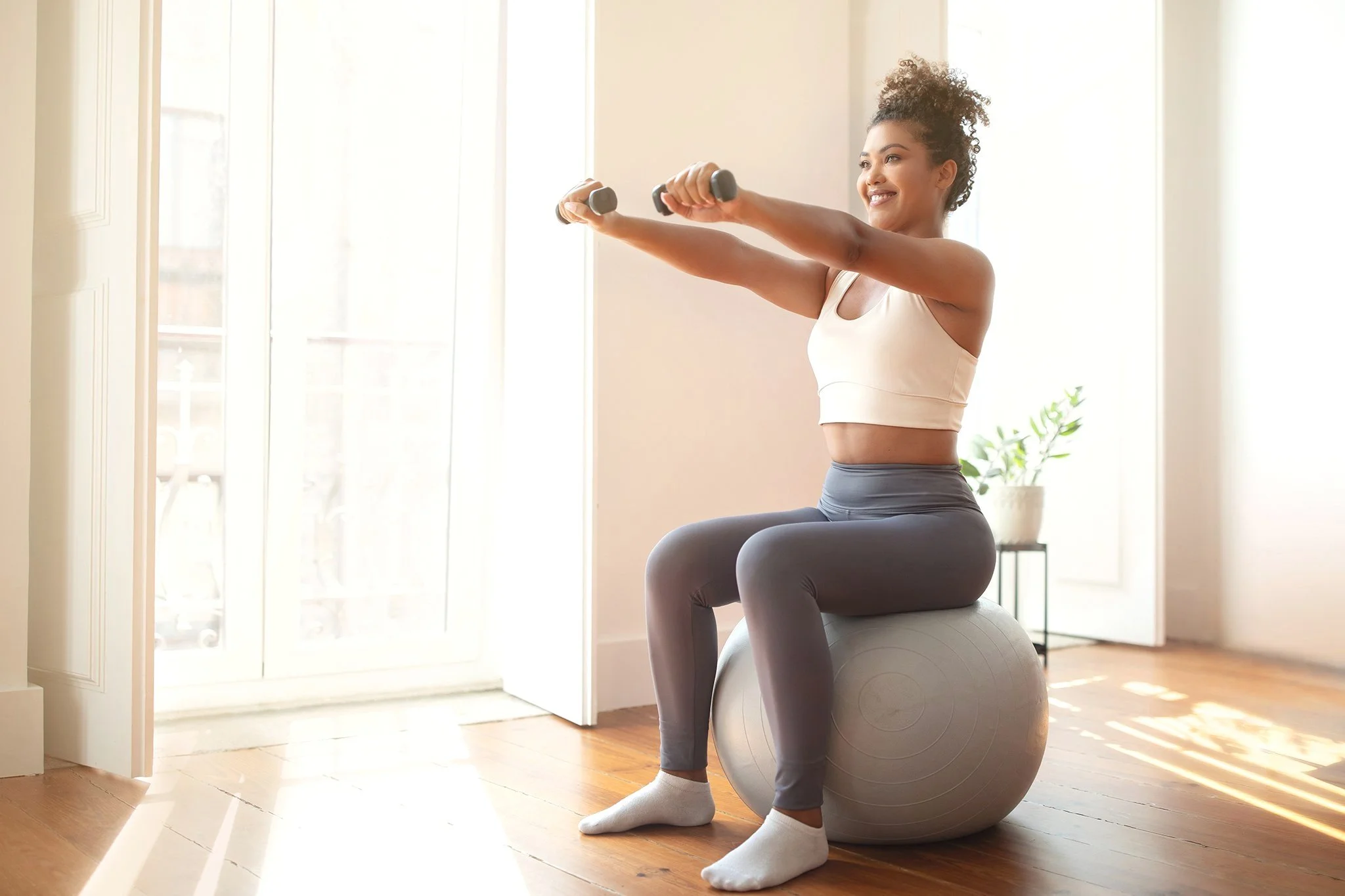 Girl exercising on Balance Ballsm.jpg