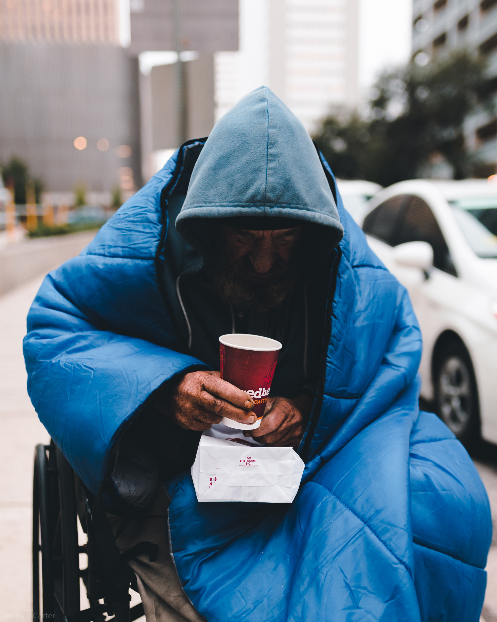 man in blue with cup.jpg