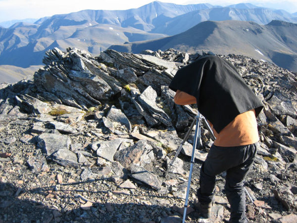 Claude-with-4x5-camera-in-the-De-Long-Mountains-Alaska-2005-600x450.jpg