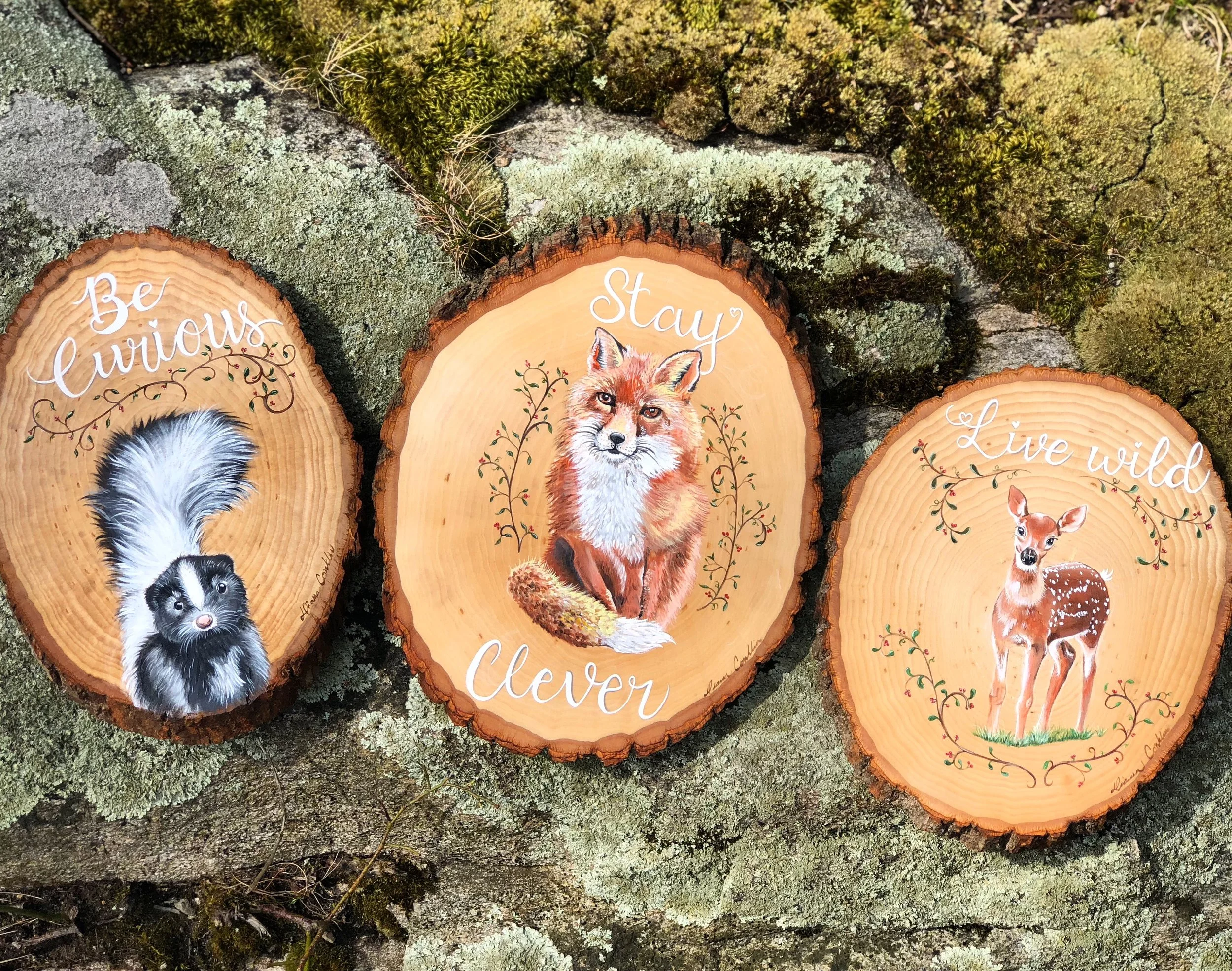 Woodland creatures on wood slabs 