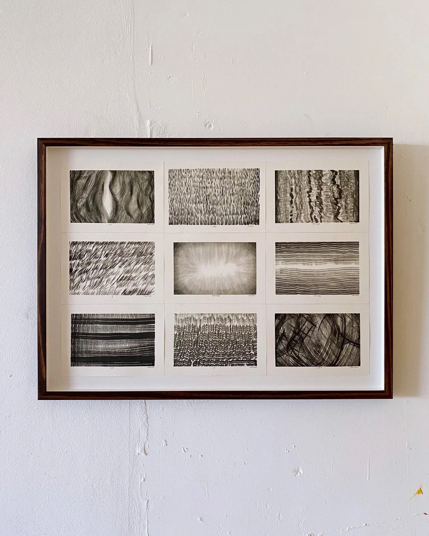 Nine small paper works in one walnut frame under Ultraview glass. For @jessicasinta