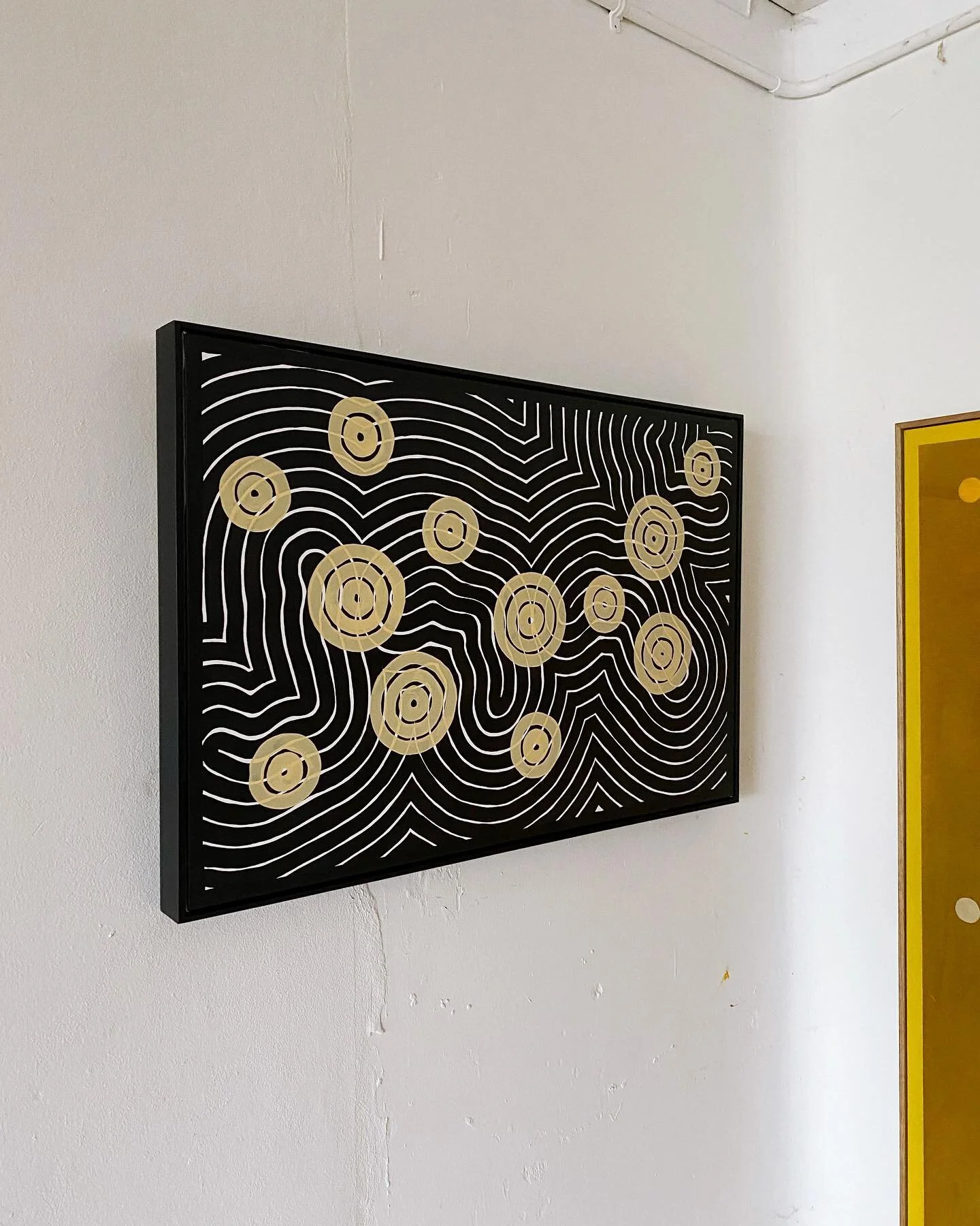 An @otishopecarey work sitting nicely in our hand stained black box frame