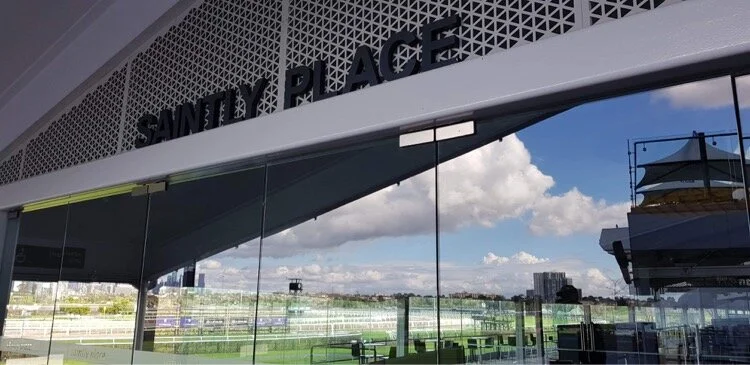 The entrance to Saintly Place, located beneath the general admission Hill Stand at Flemington. Formerly known as The Undercroft, the area was renamed in honour of both horse and trainer.