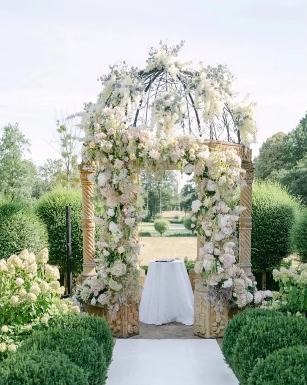 Gorgeous set up for a garden wedding! 
The Gazebo at @chateauchallain is perfect for your Wedding Ceremony, with the view down to the lake and the Chateau in the background

#chateauwedding #weddingflorals #floraldesigns #weddingceremony #2026wedding