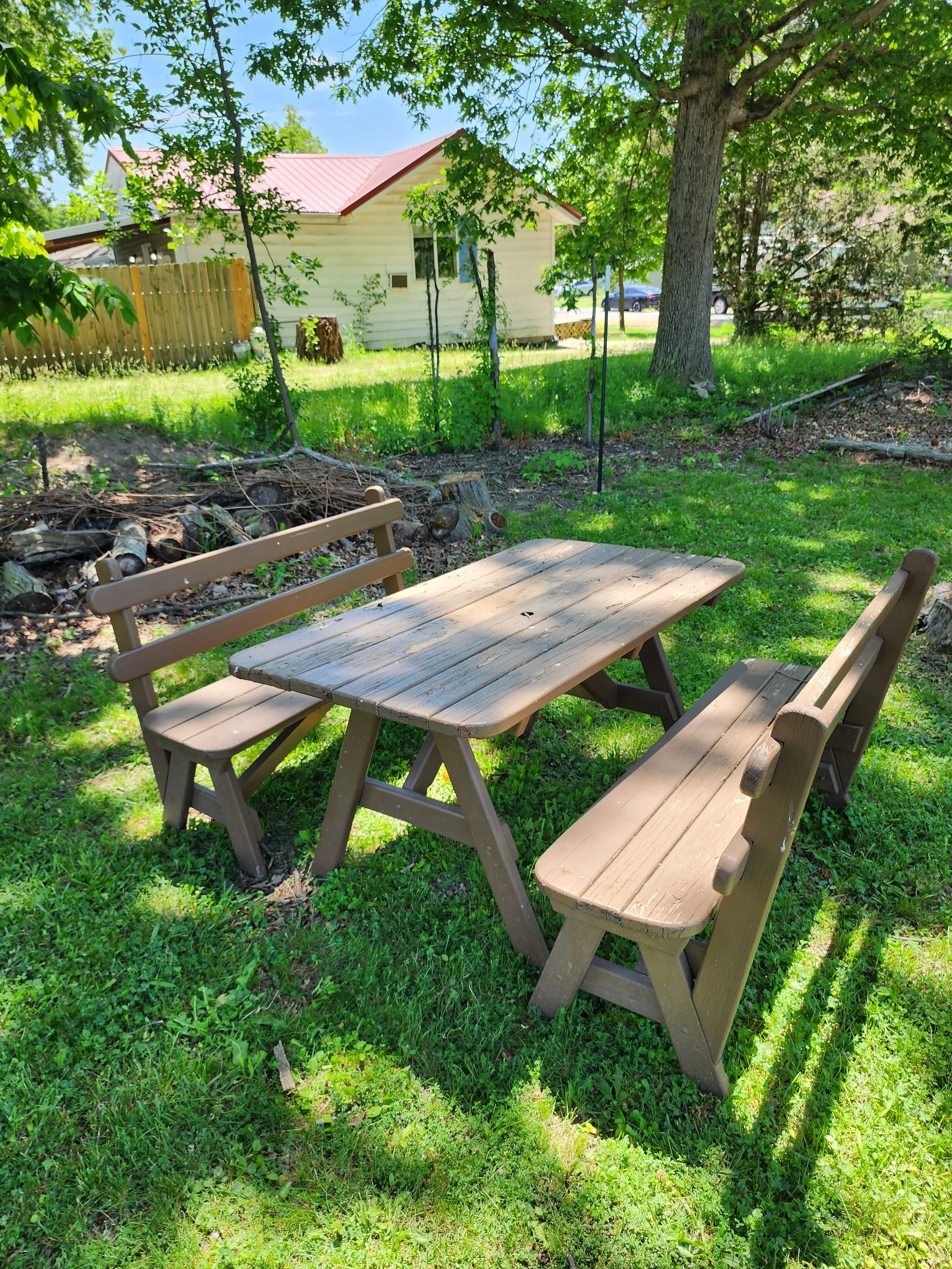  Three streets down a neighbor posted this homemade table and bench set for FREE! We just had to haul away ourselves. Larry took over bath time for the girls and I made a mad dash to cram each piece into our vehicles. We’re going to clean it up and f