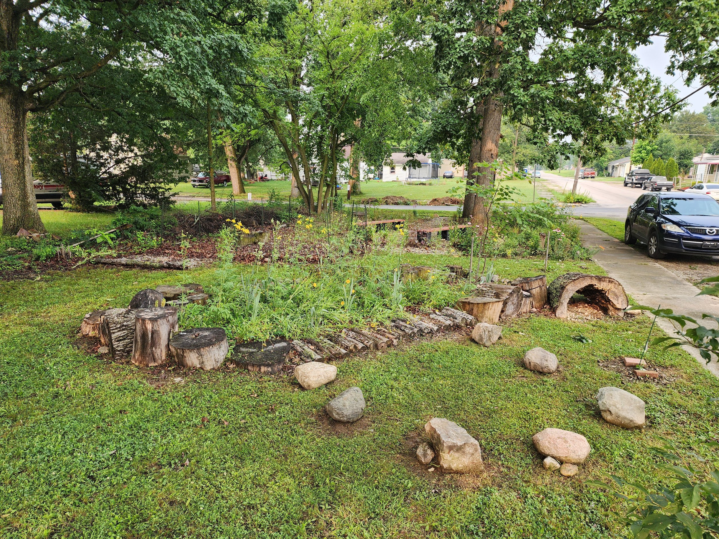  We got a couple dozen amazing landscaping boulders from a FREE marketplace listing in Roanoke. We used a handful of them to expand on the nature playscape (or obstacle course as they like to call it) and took the rest home. Up next, we are planning 