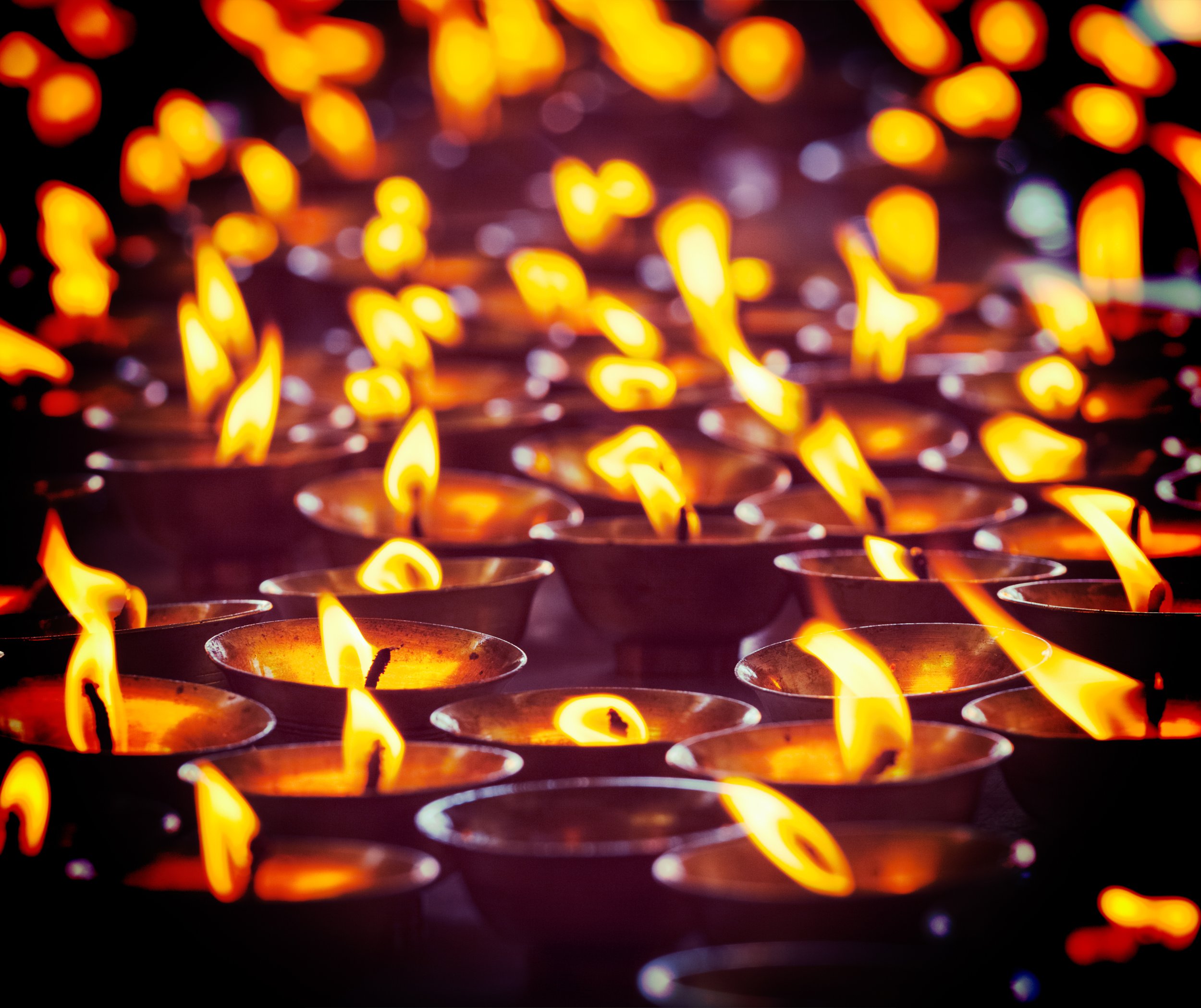 Burning-candles-in-Buddhist-temple,-McLeod-Ganj-518043563_3225x2708.jpeg