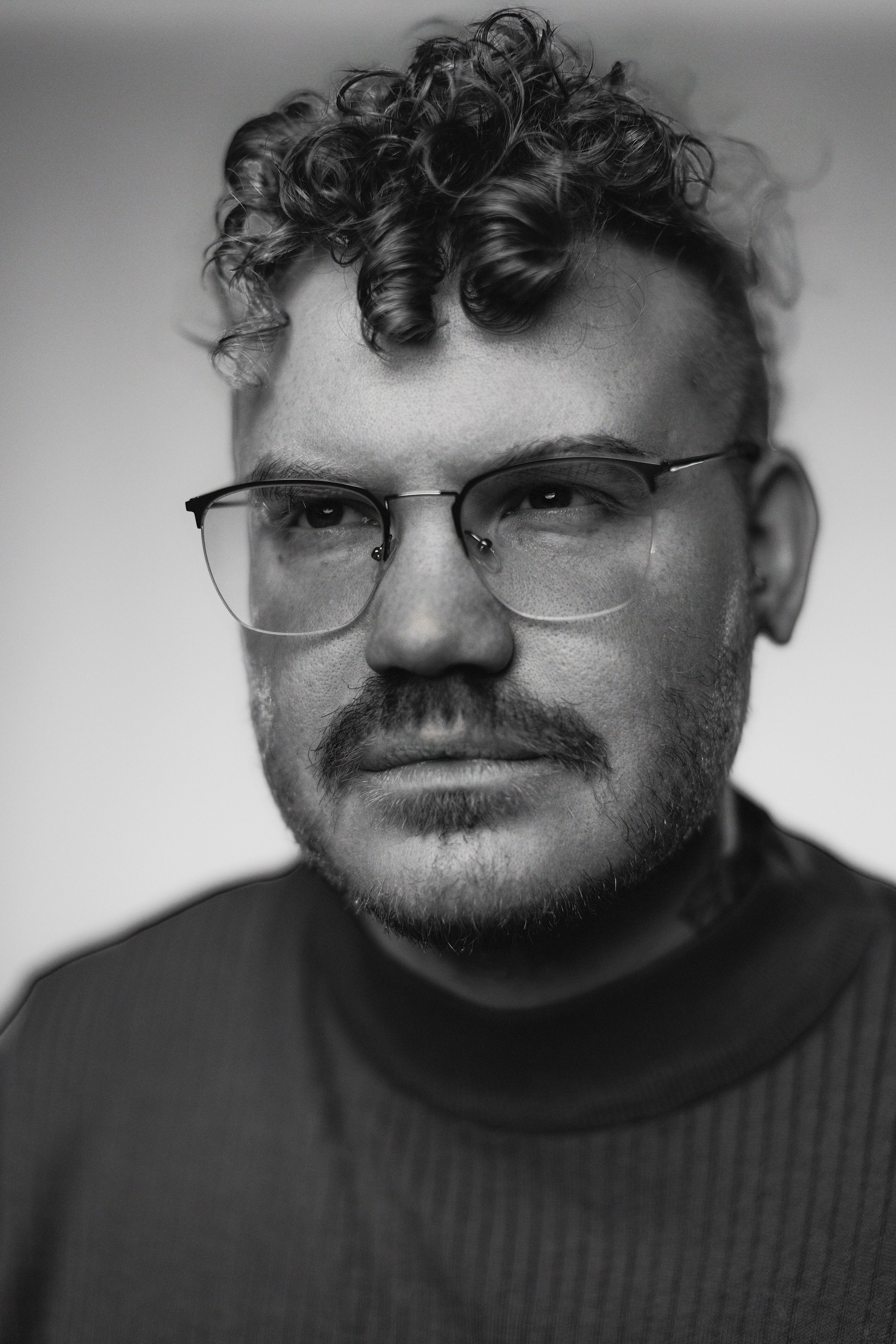 Micky Farmer Headshot BW copy.jpeg