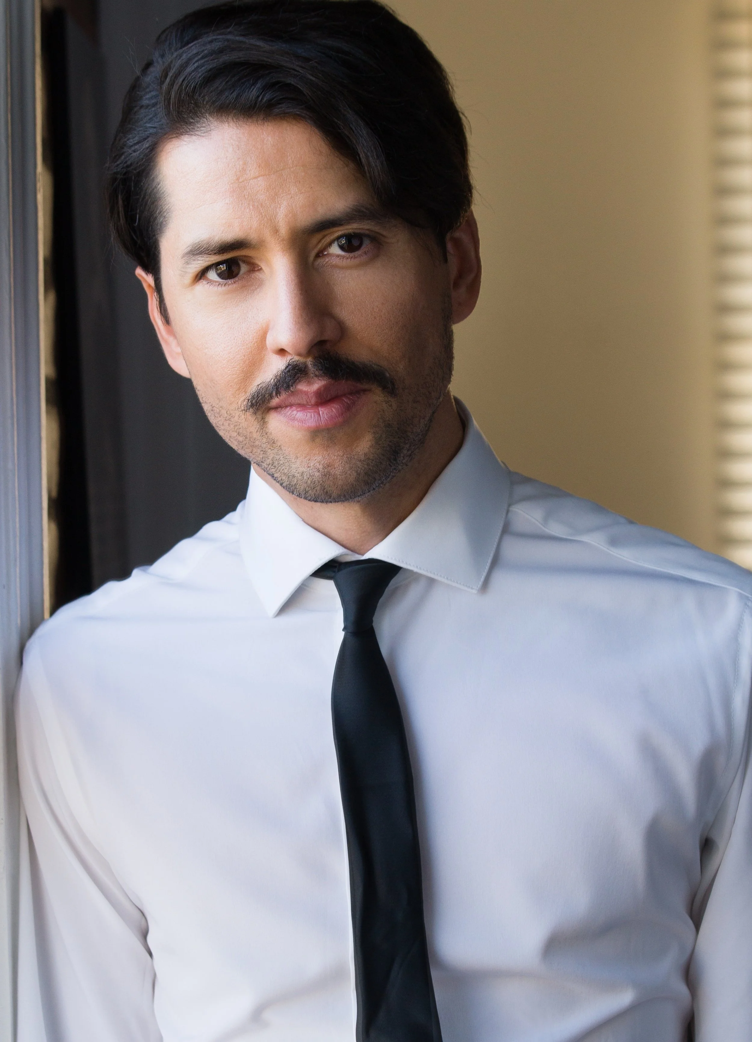 Christopher Bustos biz.jpg