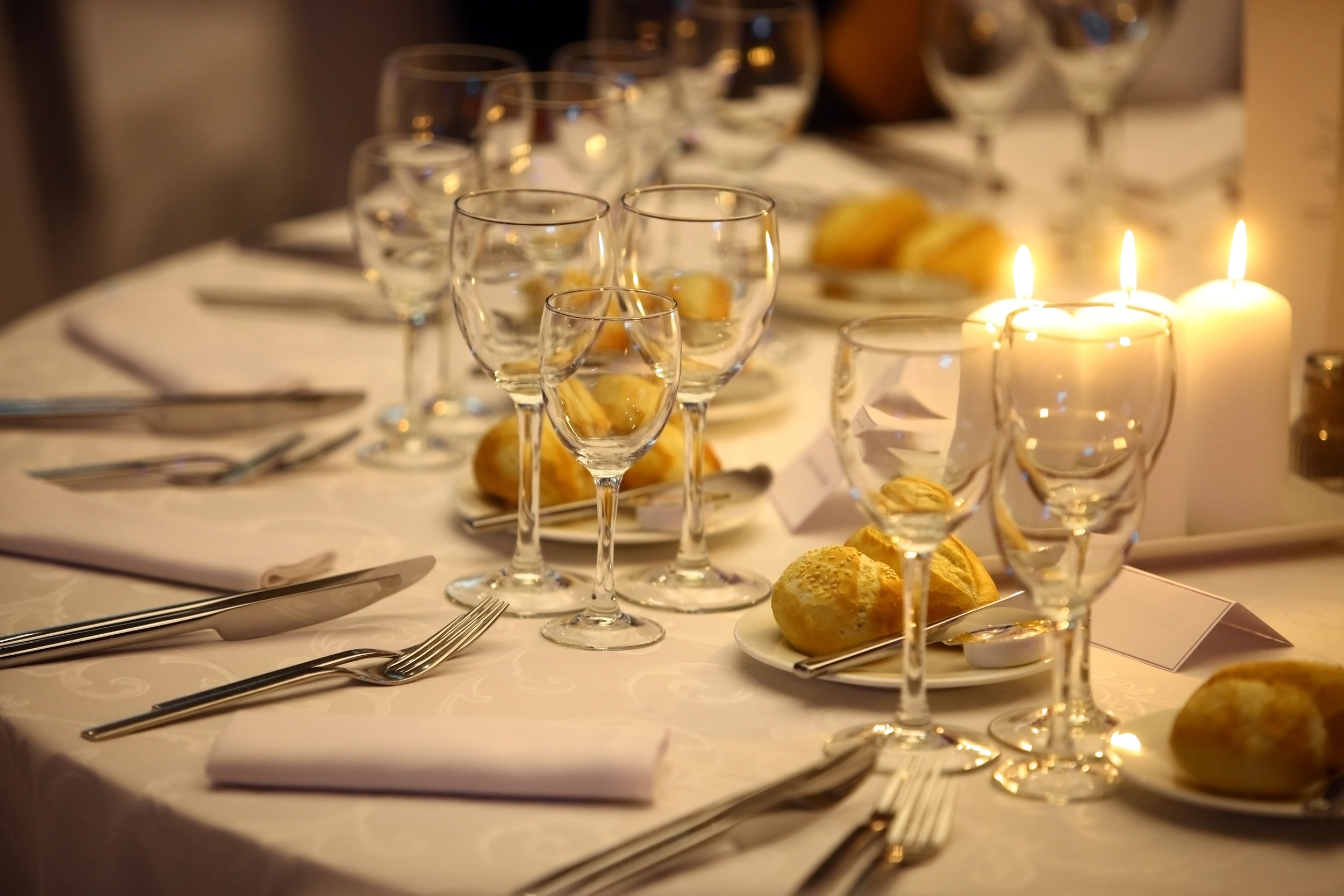 F&G Partial view of set table with candles.jpg