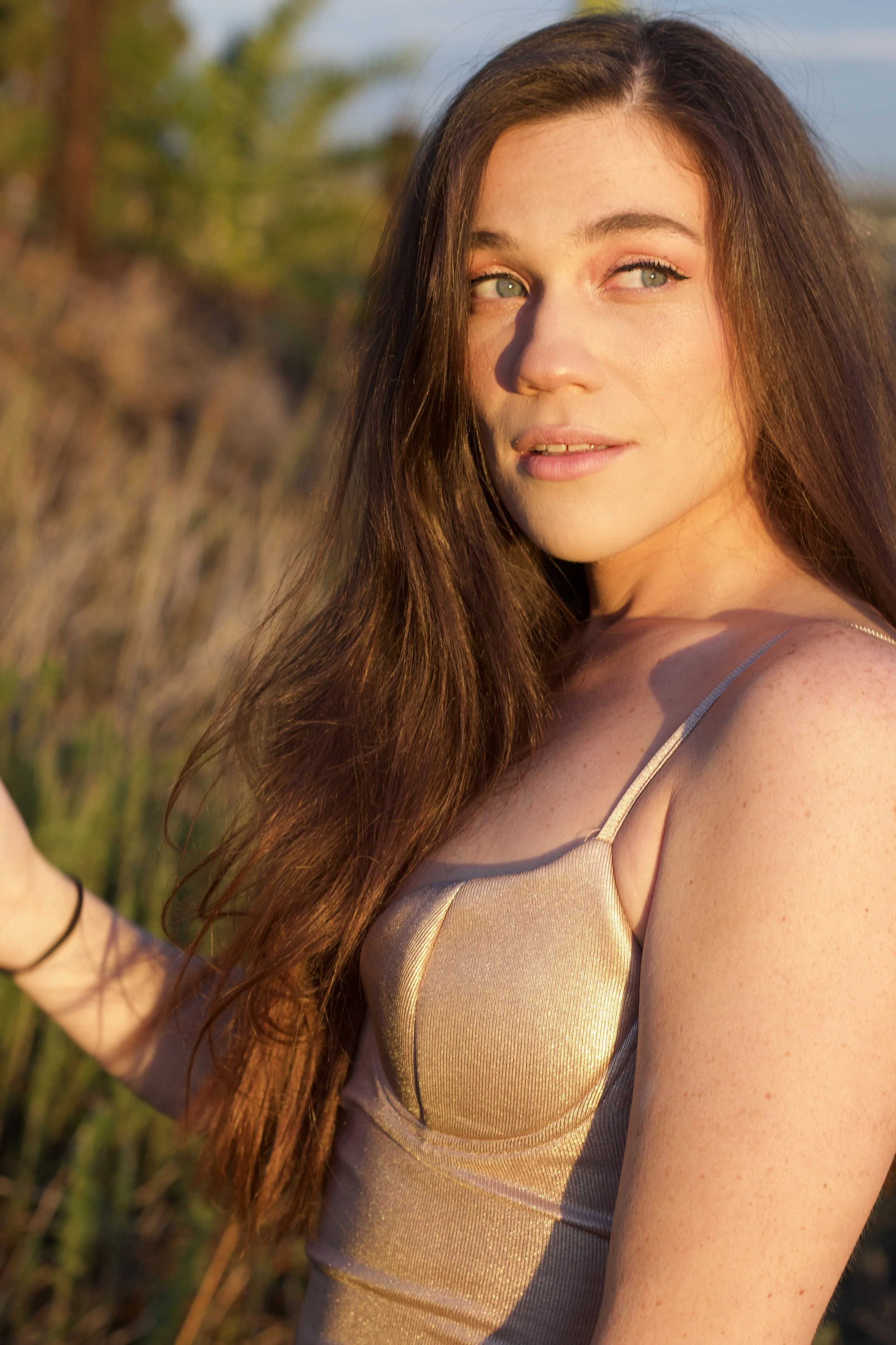 MP Looking Left Profile Gold Dress.jpeg