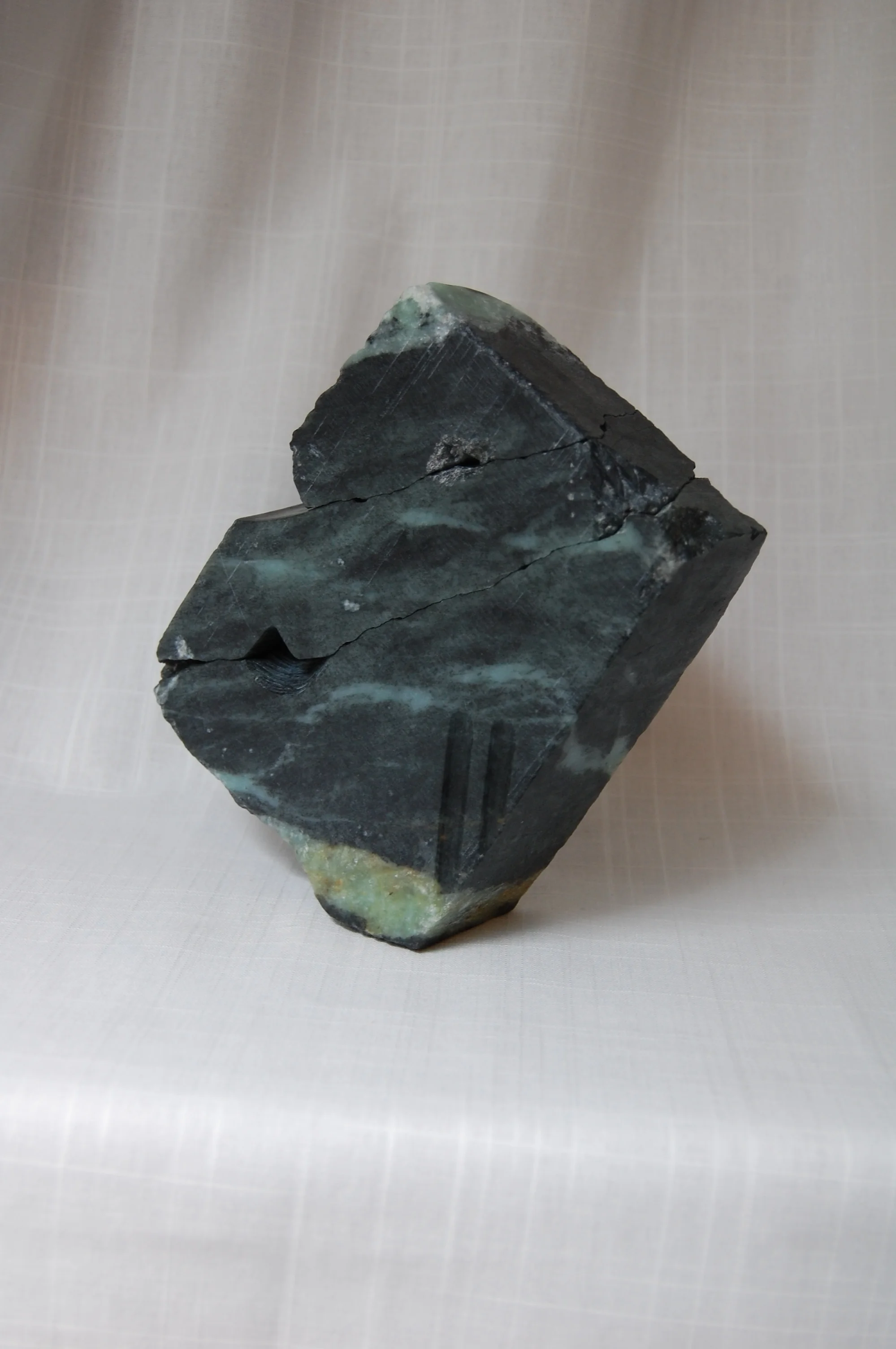 Strata, 2019. Hand-carved green soapstone. Dimensions: 7.75” H x 7” W x 2.5” D (approximate). Price, $750. Available at Susan Eley Fine Art.Artist Statement: I may have a plan for the stone, but the stone also has a plan for me; we adjust and respon…