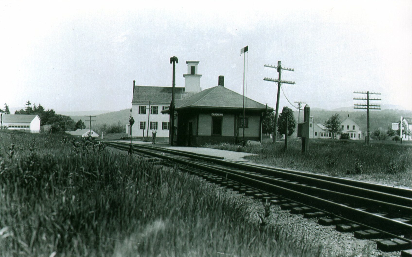 Meetinghouse, with Cardigan Depot in foreground.