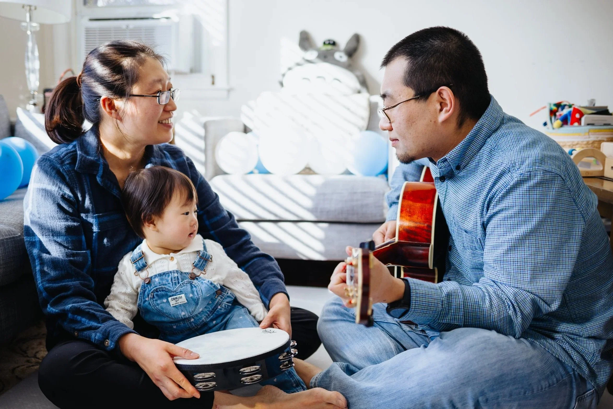 Family playing music during a lifestyle session in Grafton.