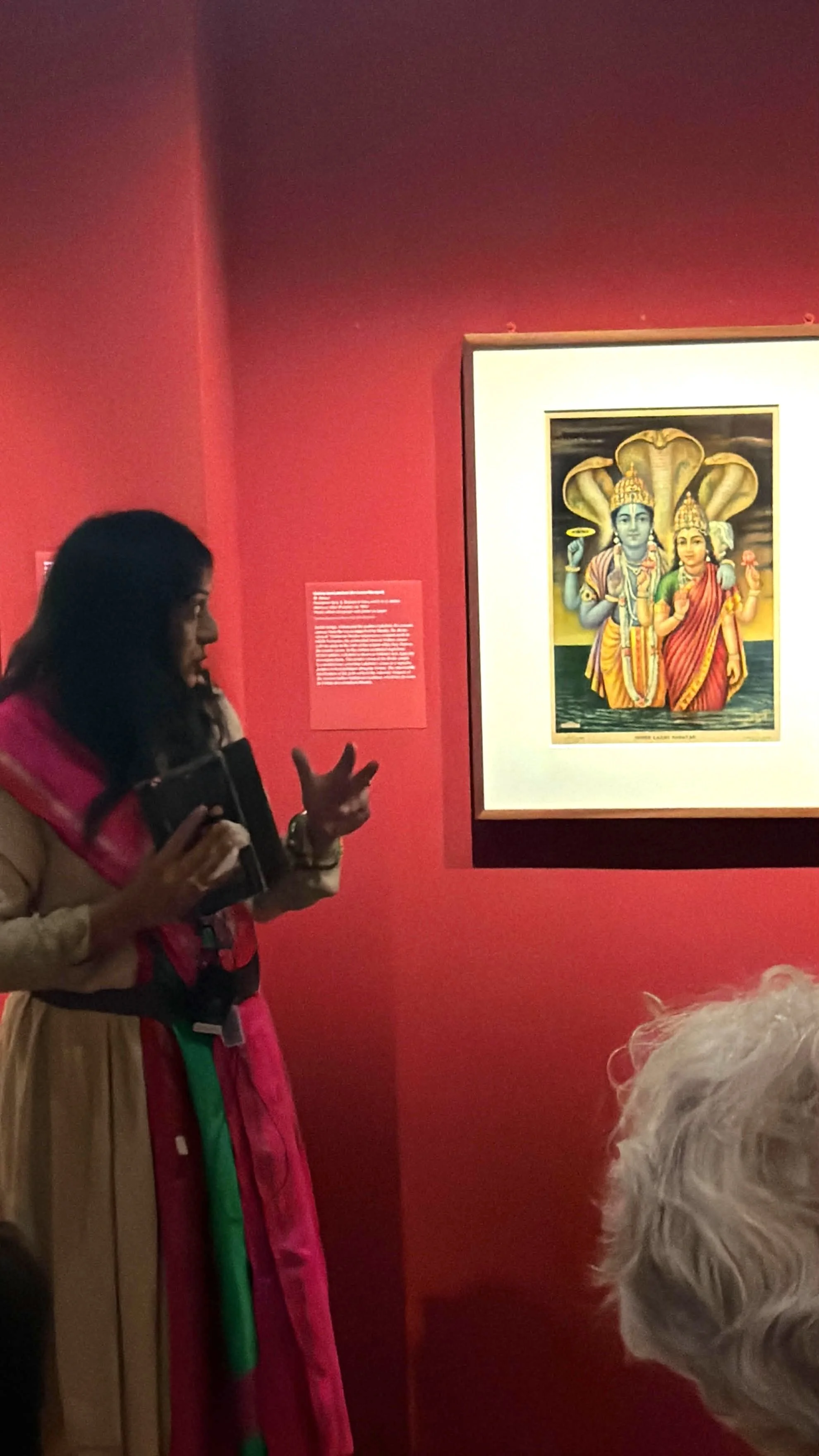 Hindu Chaplain Sangeetha Kowsik speaking about Hindu devotional art and sacred imagery during an educational program at the metropolitan museum of art