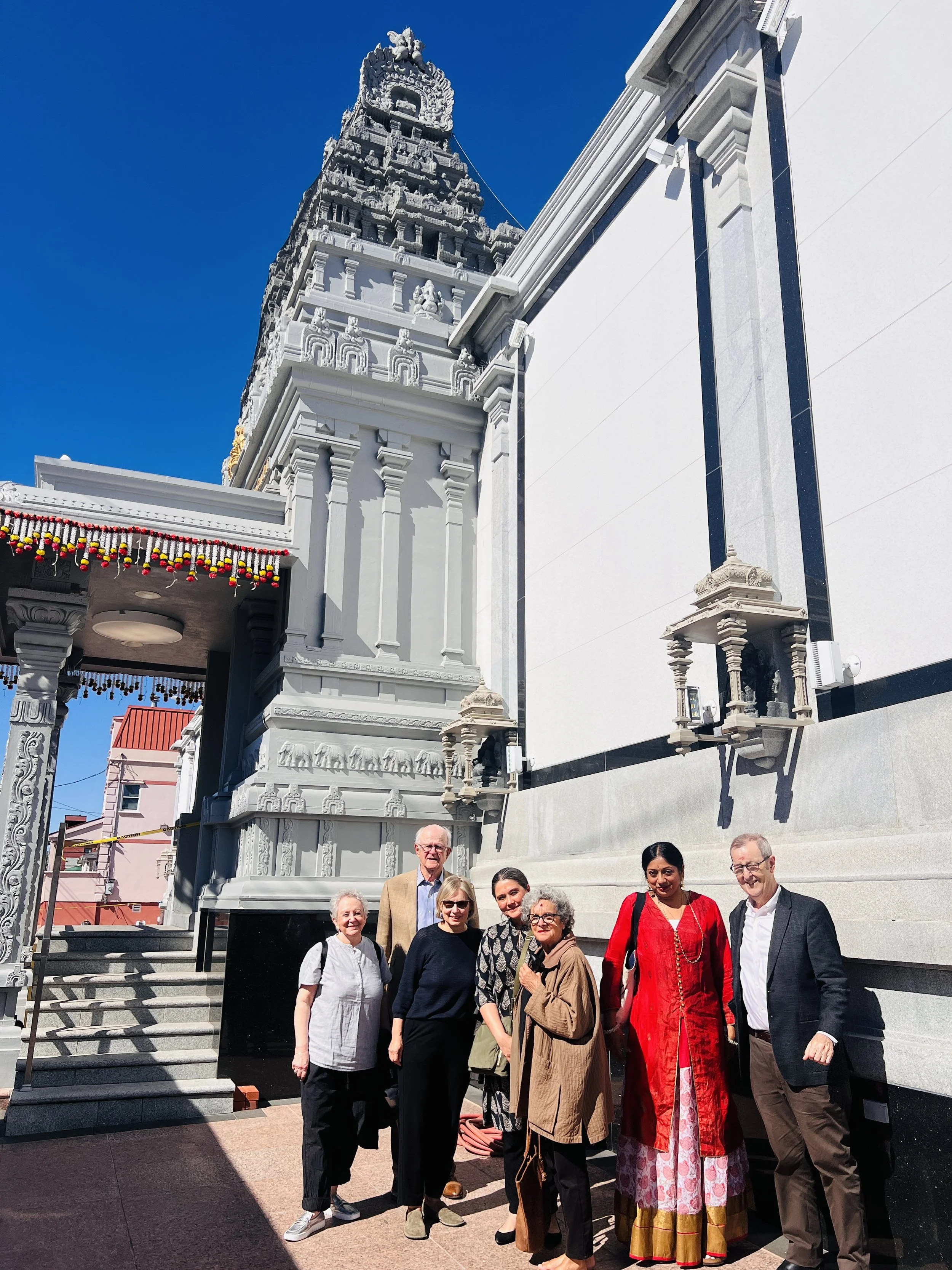Sangeetha Kowsik with Dr. John Guy and museum colleagues outside the Hindu Temple Society of North America’s Ganesha Temple in Flushing, New York.