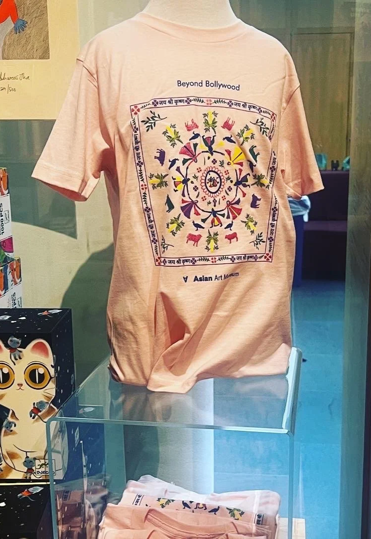 Beyond Bollywood T-shirt designed by Sangeetha Kowsik for the Asian Art Museum, featuring artwork celebrating the history and cultural contributions of Indian Americans.
