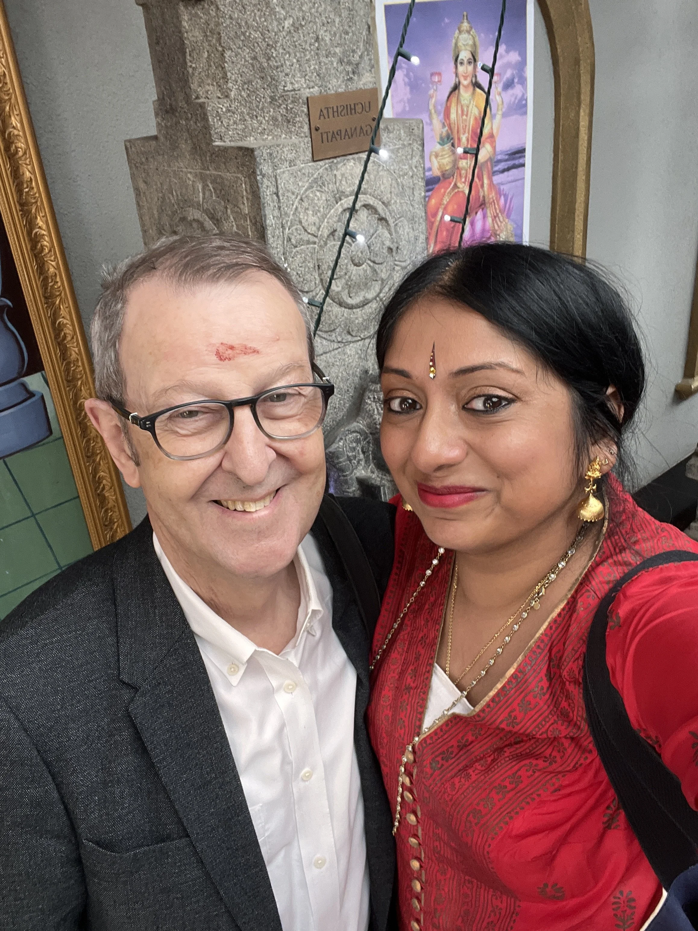 Hindu Chaplain Sangeetha Kowsik with Dr. John Guy, curator of South and Southeast Asian art at The Metropolitan Museum of Art, during a visit to the Flushing Ganesha Temple.