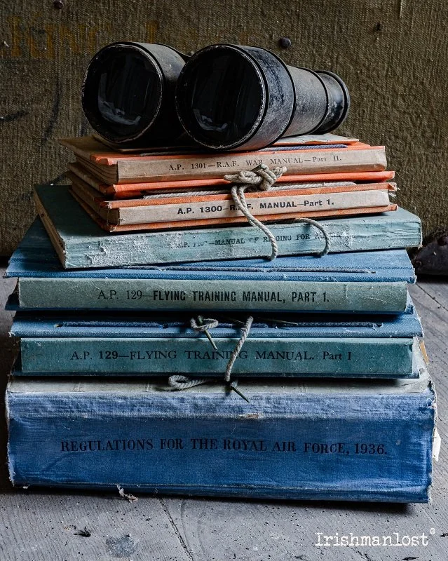 flying manuals from 1936 and binoculars which belonged to a WW2 pilot during the war