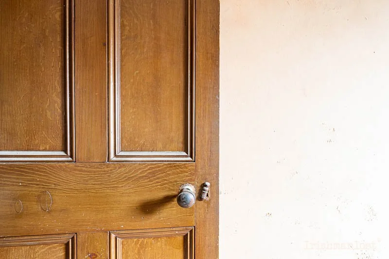 Detail of one of the original doors on the upper floors