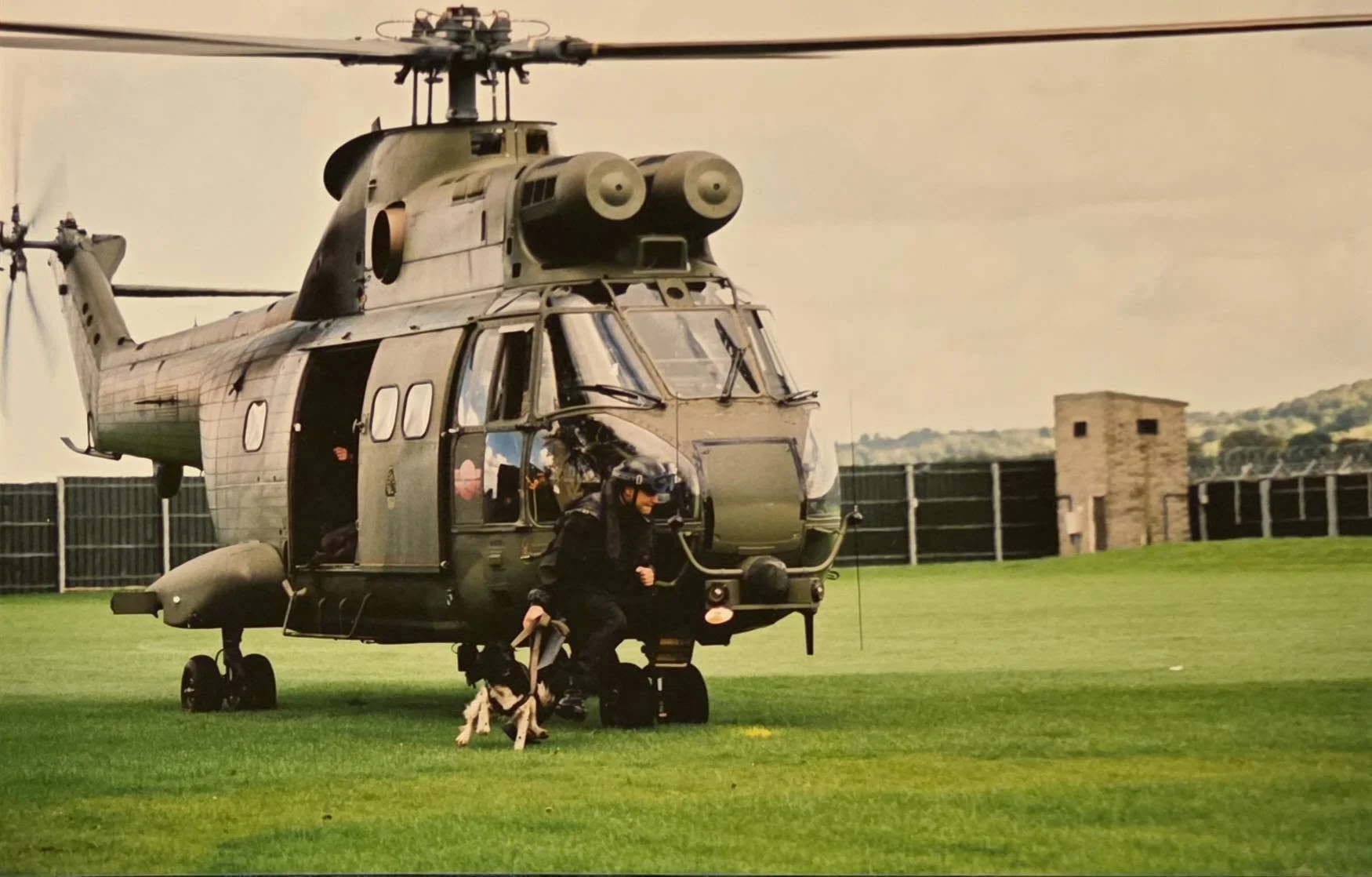Puma Helicopter dropping off a dog handler at moscow army camp belfast during the troubles