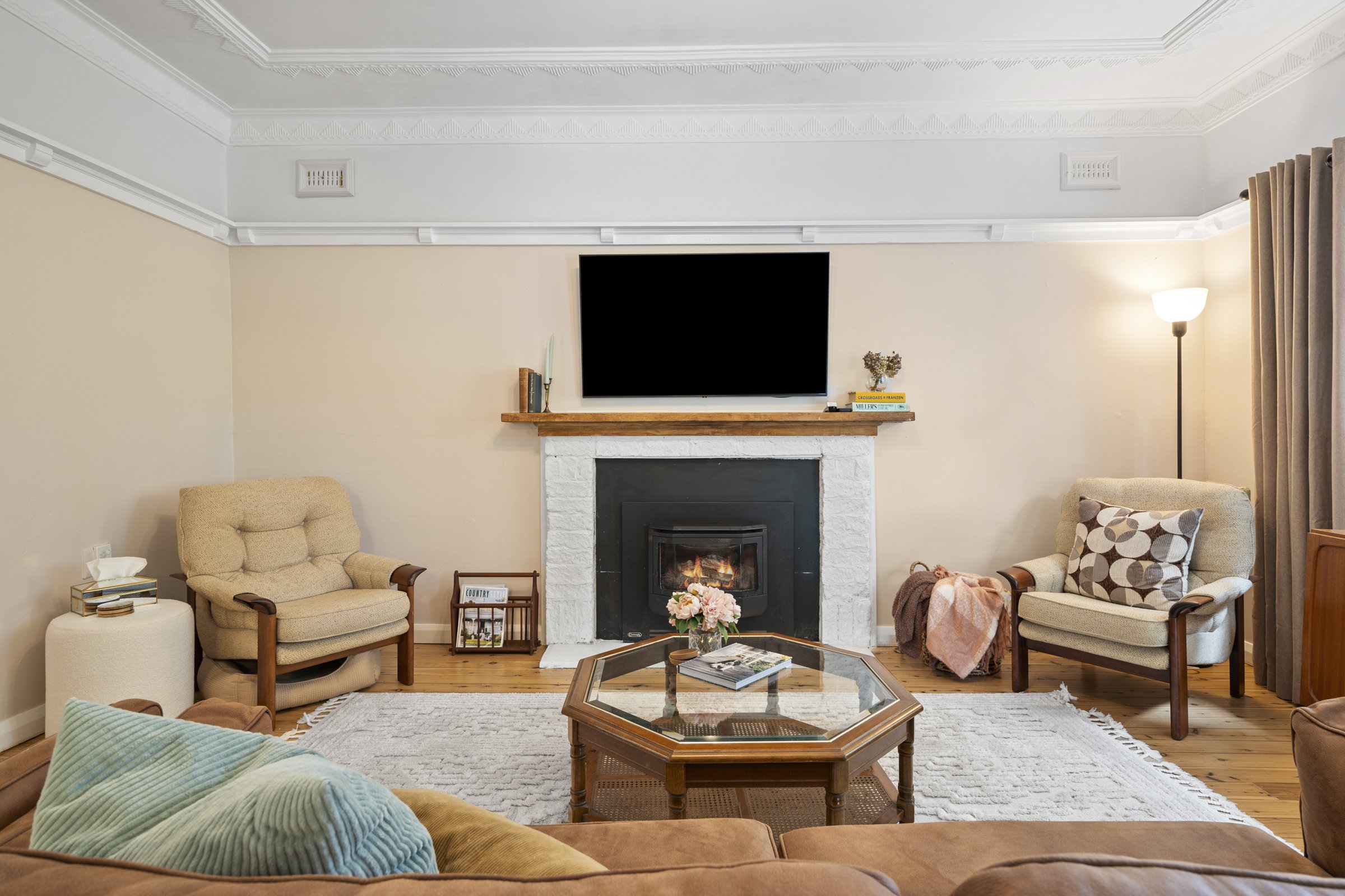 Lounge area fireplace at hume avenue wentworth falls