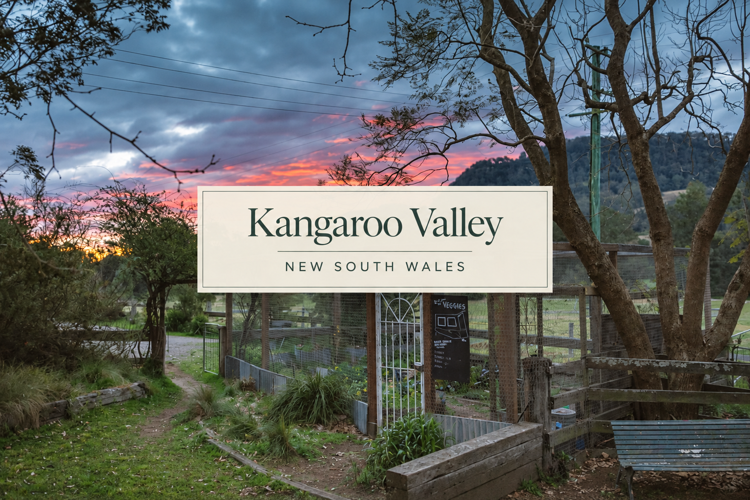 Kangaroo Valley op shop and vintage treasure guide, featuring a rustic garden and farm setting surrounded by trees, hills and a dramatic sunset in New South Wales.