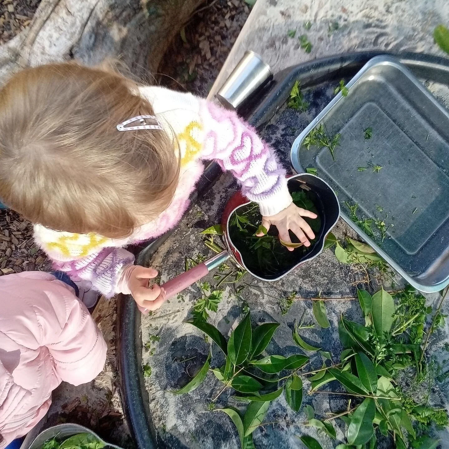 Children play for hours at our potion table, mixing, squirting, stirring. As the contents included leaves, twigs, water and berries from the trees, we saw all different colours emerge, sparking curiosity and delight amongst the children