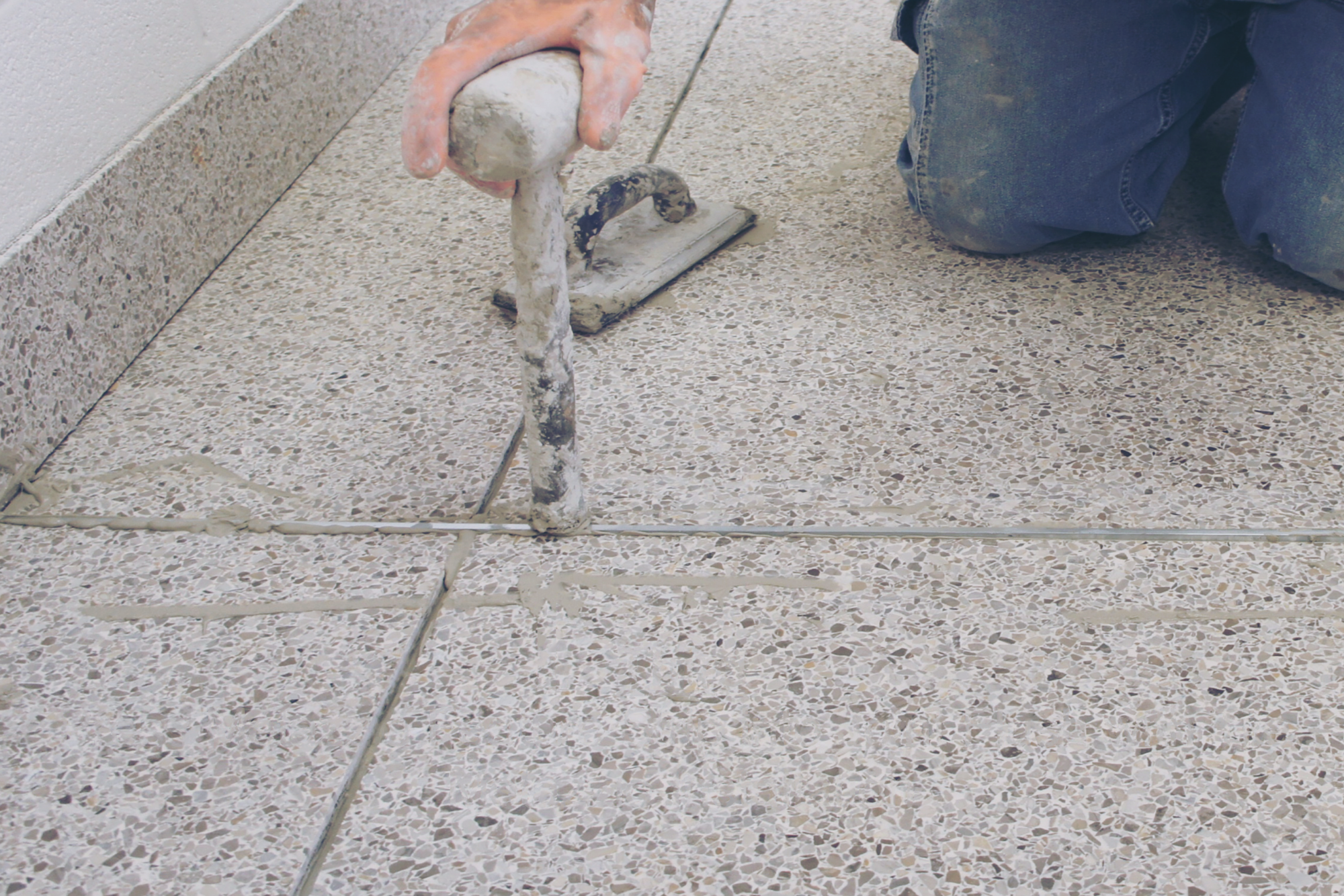 3. Press Metazzio Feature Strip into joint flush with tile