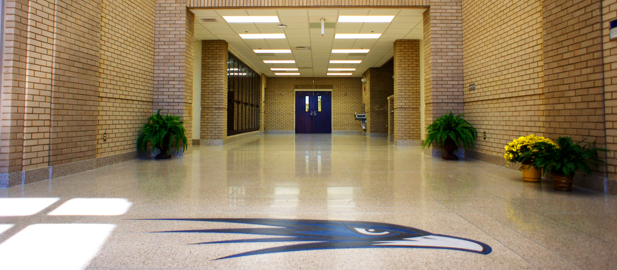 Large format terrazzo tile used to match poured-in-place terrazzo