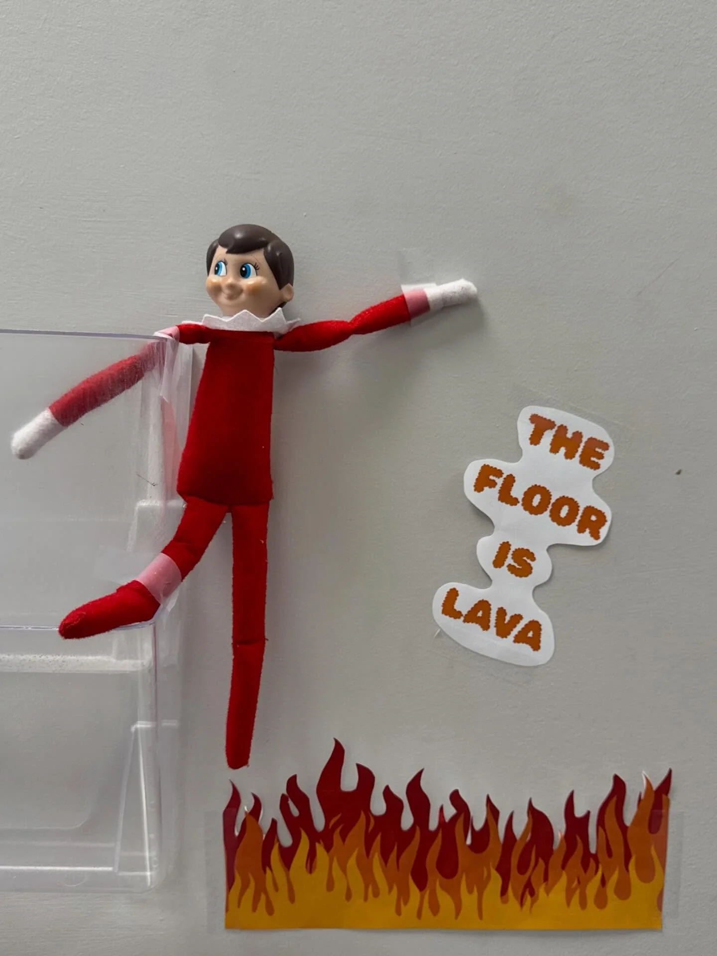 Our Elf on the Shelf, Webster, is playing The Floor Is Lava! 🔥
He&rsquo;s hopping from spot to spot trying not to touch the floor!
Silly Webster&mdash;he&rsquo;s always up to something!