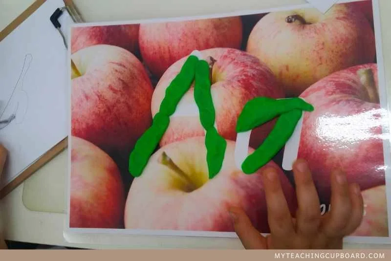 learning to form letters with alphabet playdough mats