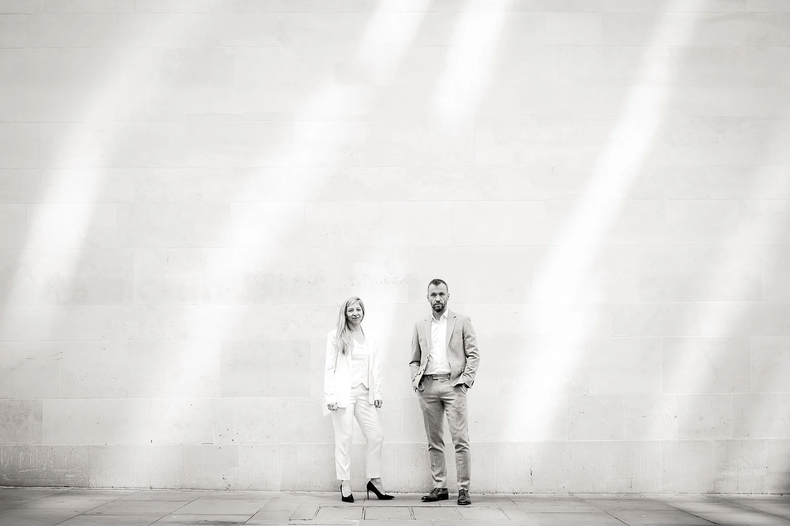 two business people photographed in black and white