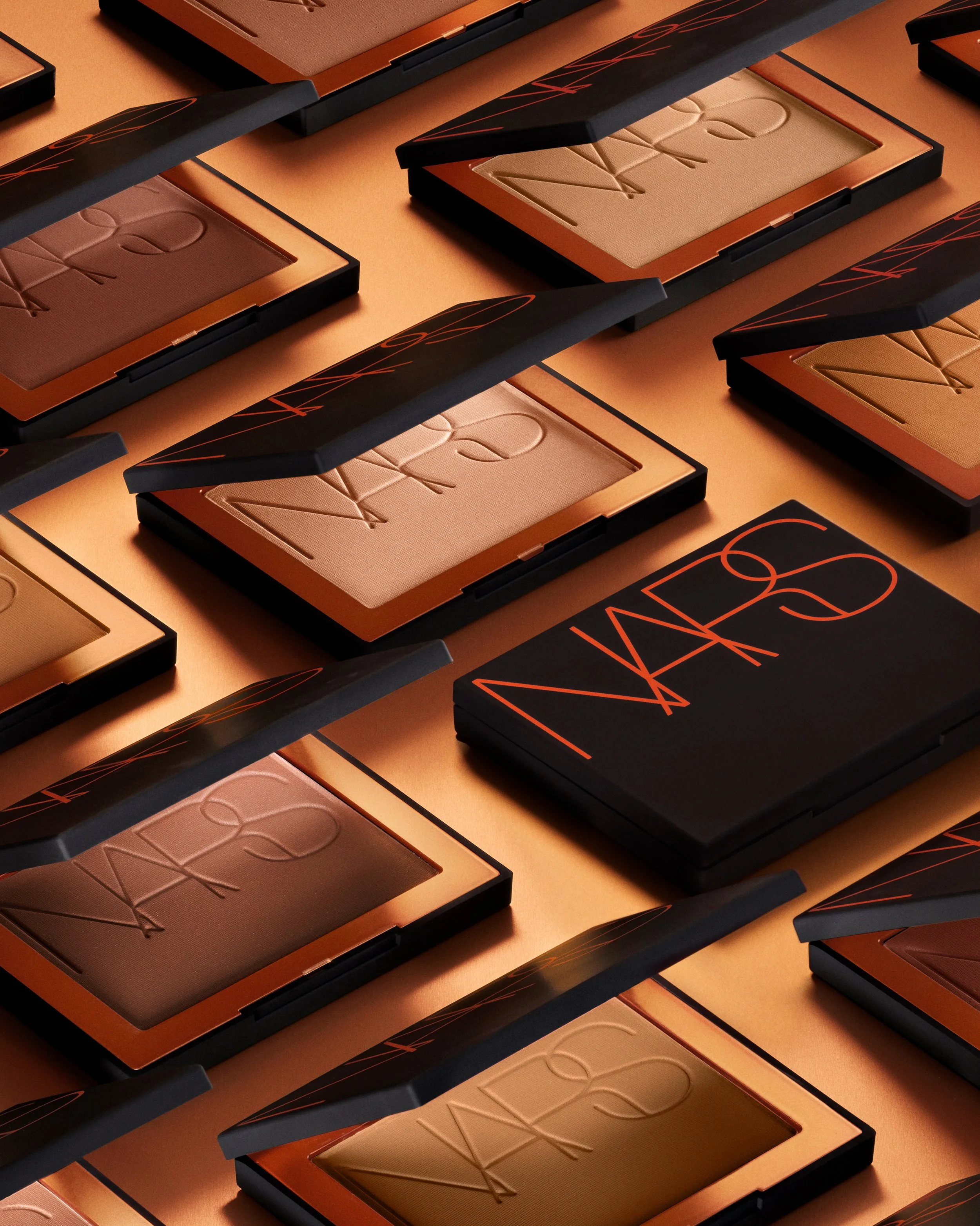 NARS_SP23_LagunaCollection_SocialCrop_DigitalFirstStill_BronzerGroup_Shot2_GLBL_B_4X5.jpg