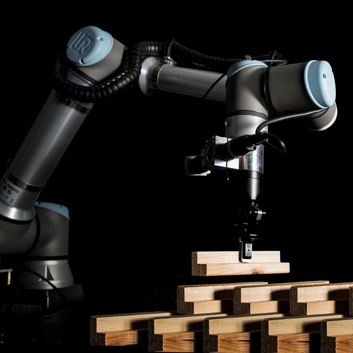 Robotic reversible timber beam