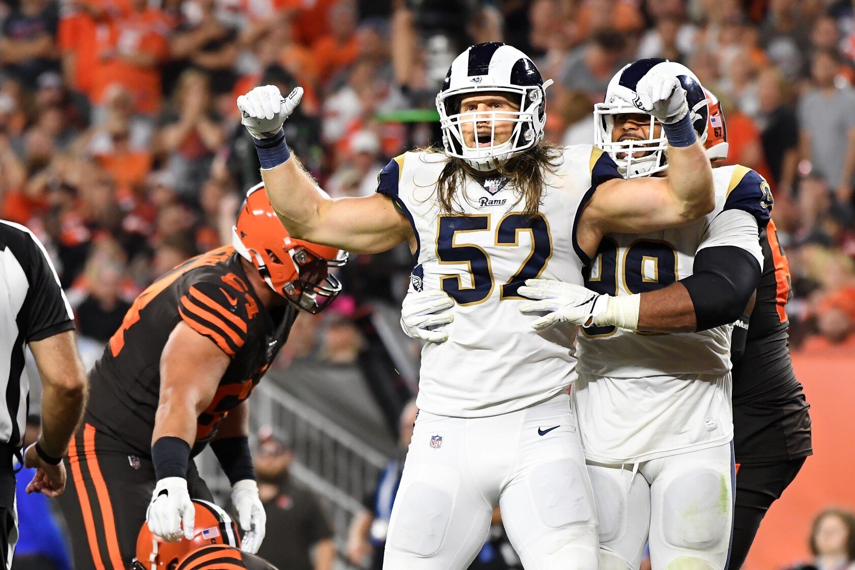 Clay Matthews III & Aaron Donald celebrating a sack.