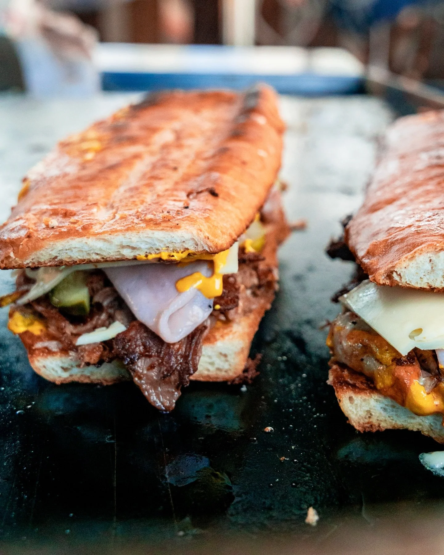 The Cubano Sandwich 🇨🇺 

&bull; Roasted Pork
&bull; Smoked Ham
&bull; Swiss Cheese
&bull; Pickles
&bull; Yellow Mustard
&bull; Chipotle

Full Schedule in our Bio!
🚐 @cg.mobilekitchen 

#cuban #cubano sandwich