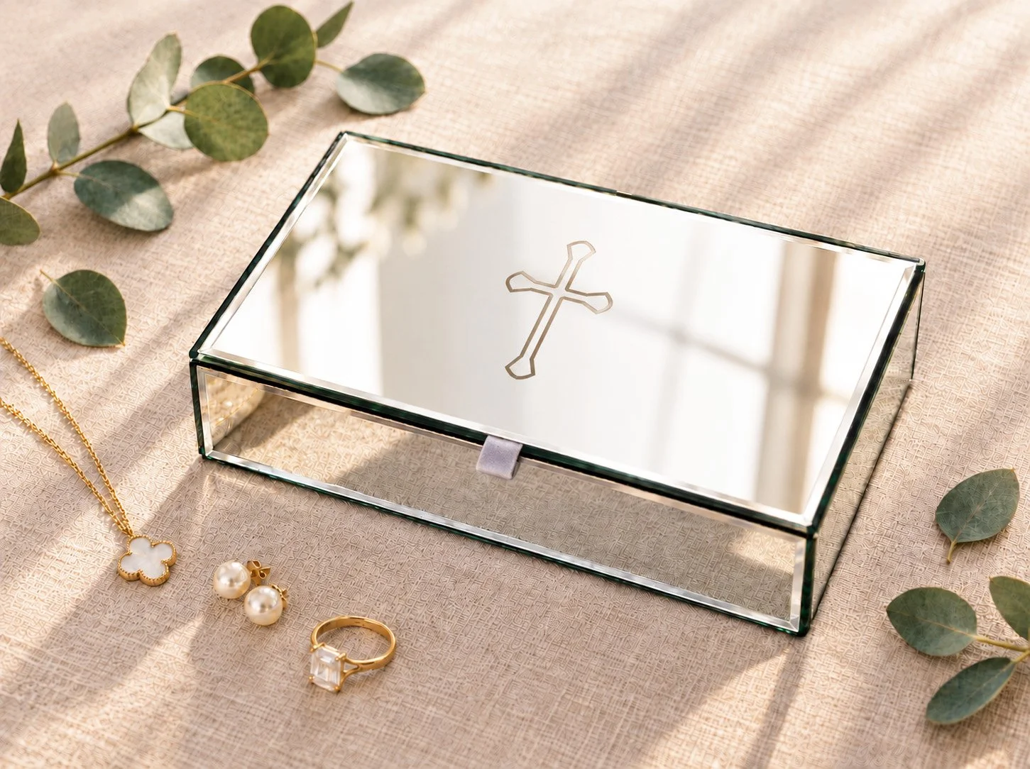 Elegant Cross-Engraved Jewelry Box Still Life.jpg