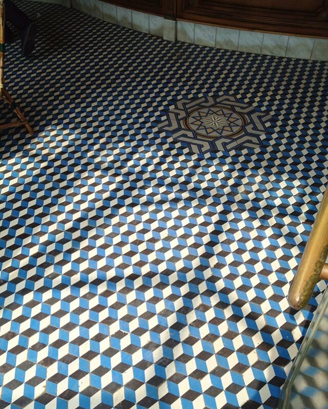 Pretty French caf&eacute; floor from a vacation long ago. Vacations! Remember those?!? Now we have to make do with listening to Edith Piaf, smoking, wearing a beret indoors and pretending to be in Paris 🚬 🥐 ☕️ 🇫🇷
.
JK smoking is bad ❌
.
.
.
#wand