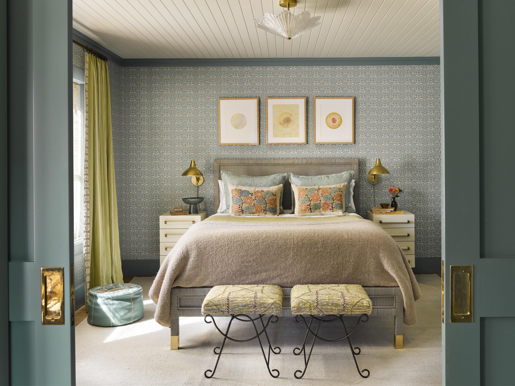   THE GUEST BEDROOM WALLS ARE COVERED IN ZAK + FOX WALLPAPER; THE TRIM IS PAINTED DONALD KAUFMAN DKC-104. THE VINTAGE WOOL KILIM RUG IS FROM ELIKO. THE CHARTREUSE LINEN CURTAINS ARE FROM NICOLA TAYLORSON, THE PAIR OF NIGHTSTANDS IS FROM CHELSEA EDITI