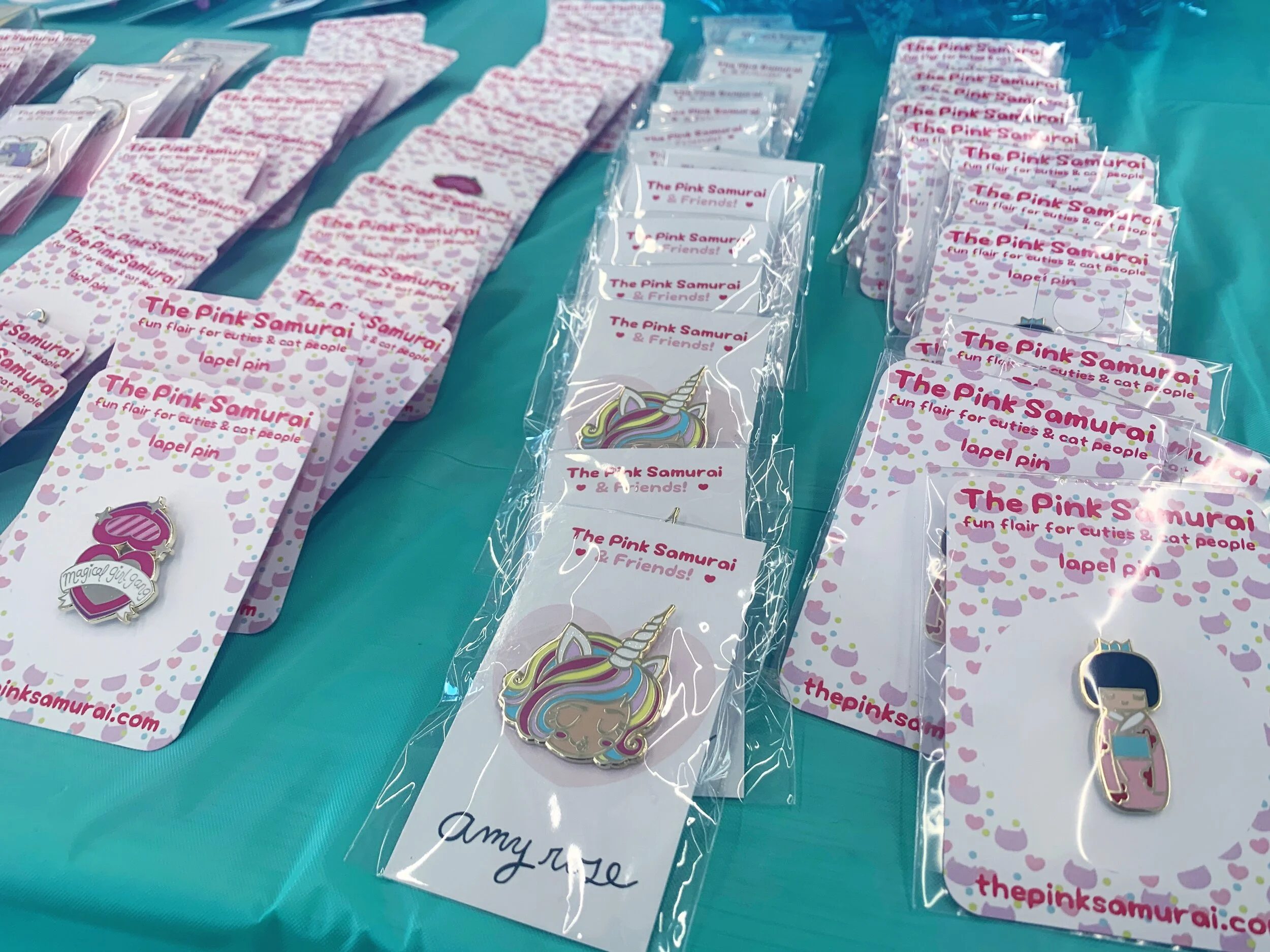 @thepinksamurai had a lot of colorful girl power pins on hand!