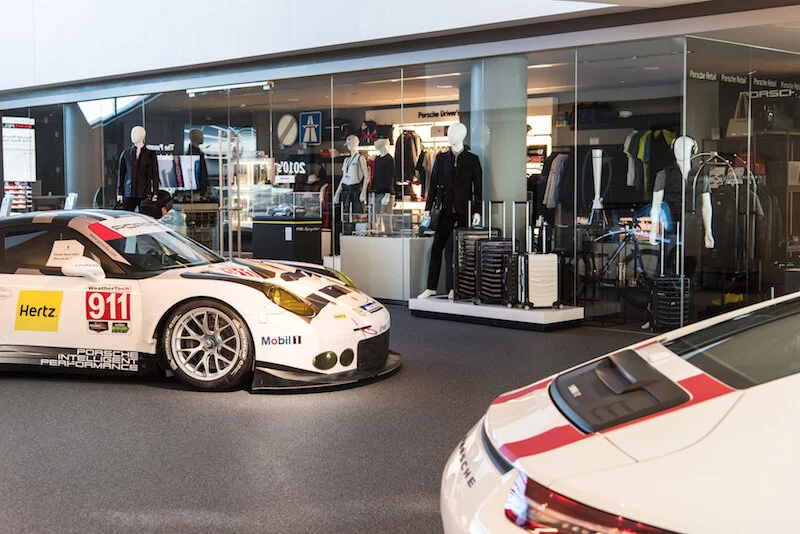 Keep your hands to yourself, but enjoy the close view of these race cars. Bring a piece of Porsche home shopping the apparel, accessories, and other spoils on your wishlist. Photo Credit: Porsche