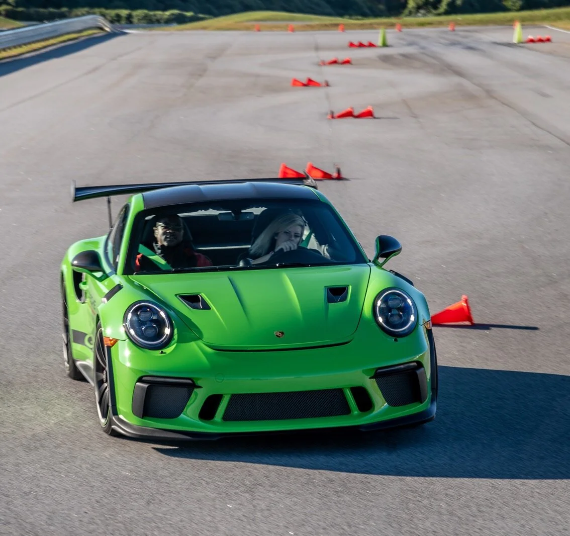 The slaloms were one of my favorite aspects of the track. Taking this part fast and precise is worth the trust you put into the drive and your coach. Photo Credit: Porsche