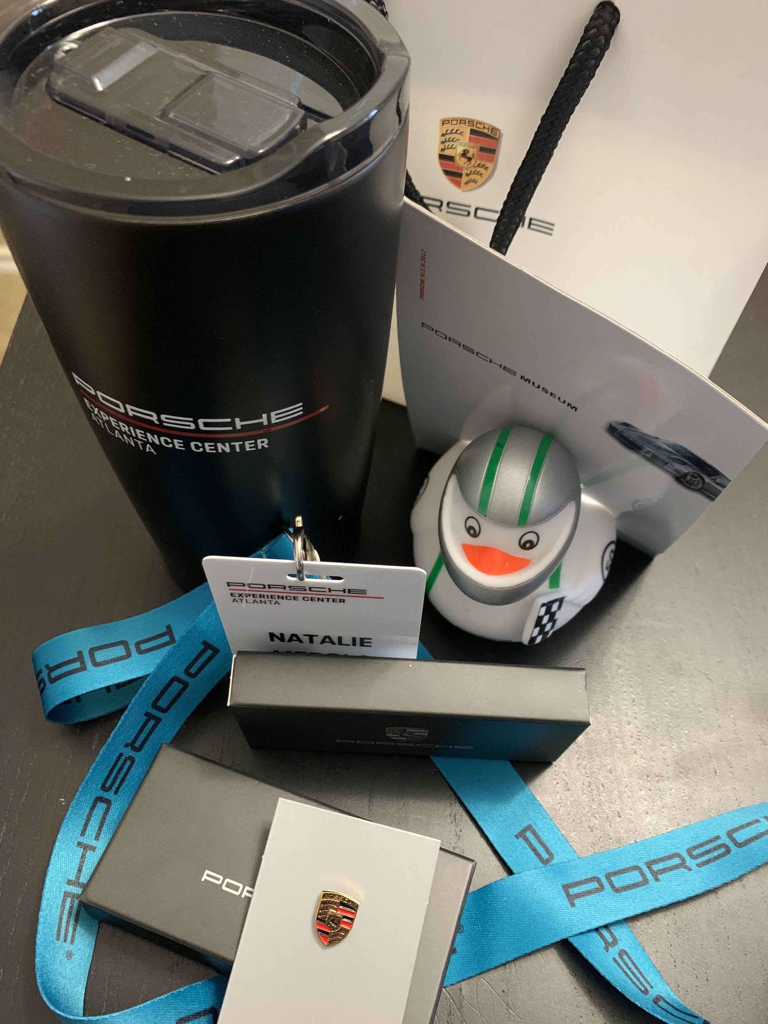 We received the coffee mug in a swag bag. I purchased the enamel pins and the cute ducky for my son.