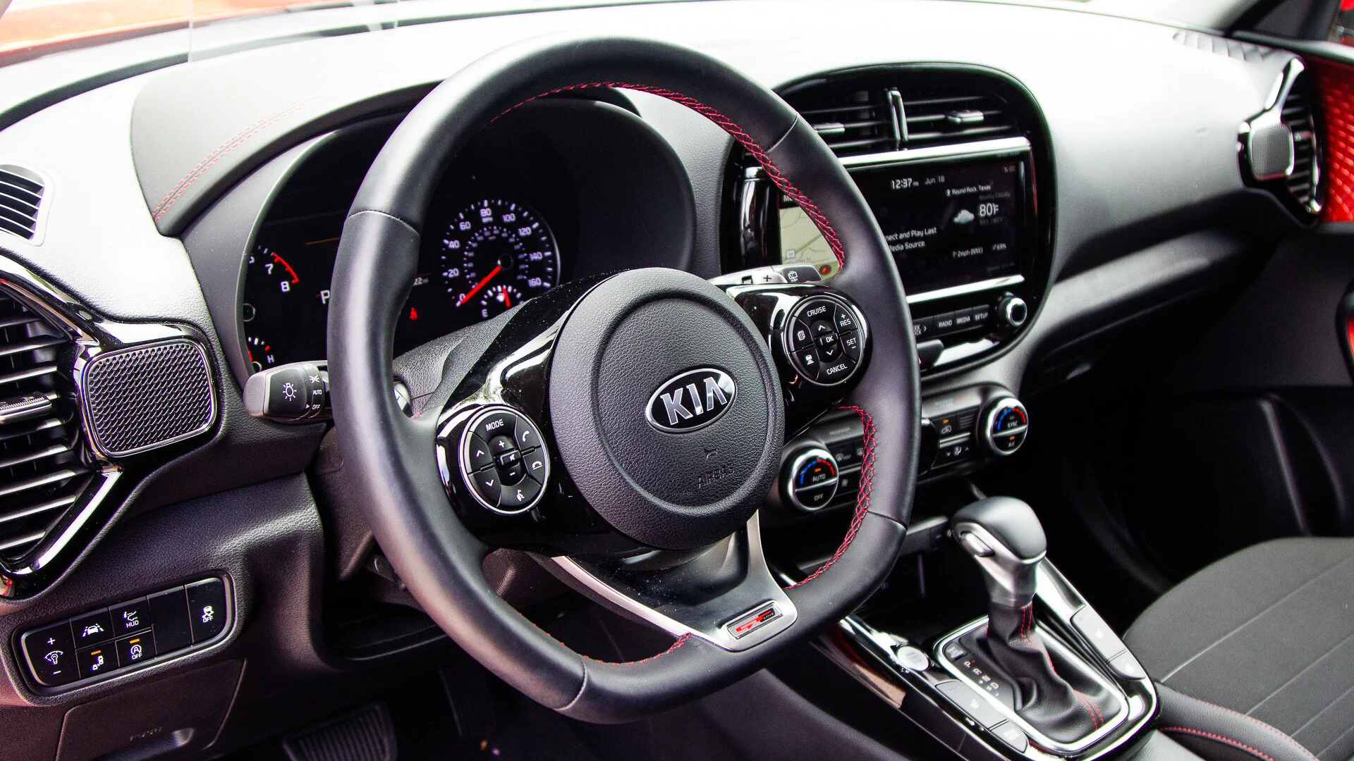 THE “D” SHAPED STEERING WHEEL GIVES THE KIA SOUL GT A SPORTY LOOK AND FEEL; AND WITH THE TURBO YOU’LL NEED THE HANDS FREE SYSTEM! NATALIE MEROLA