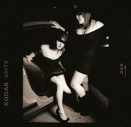 My best friend in high school and I hanging out in my first car. Photo: Julia Cox