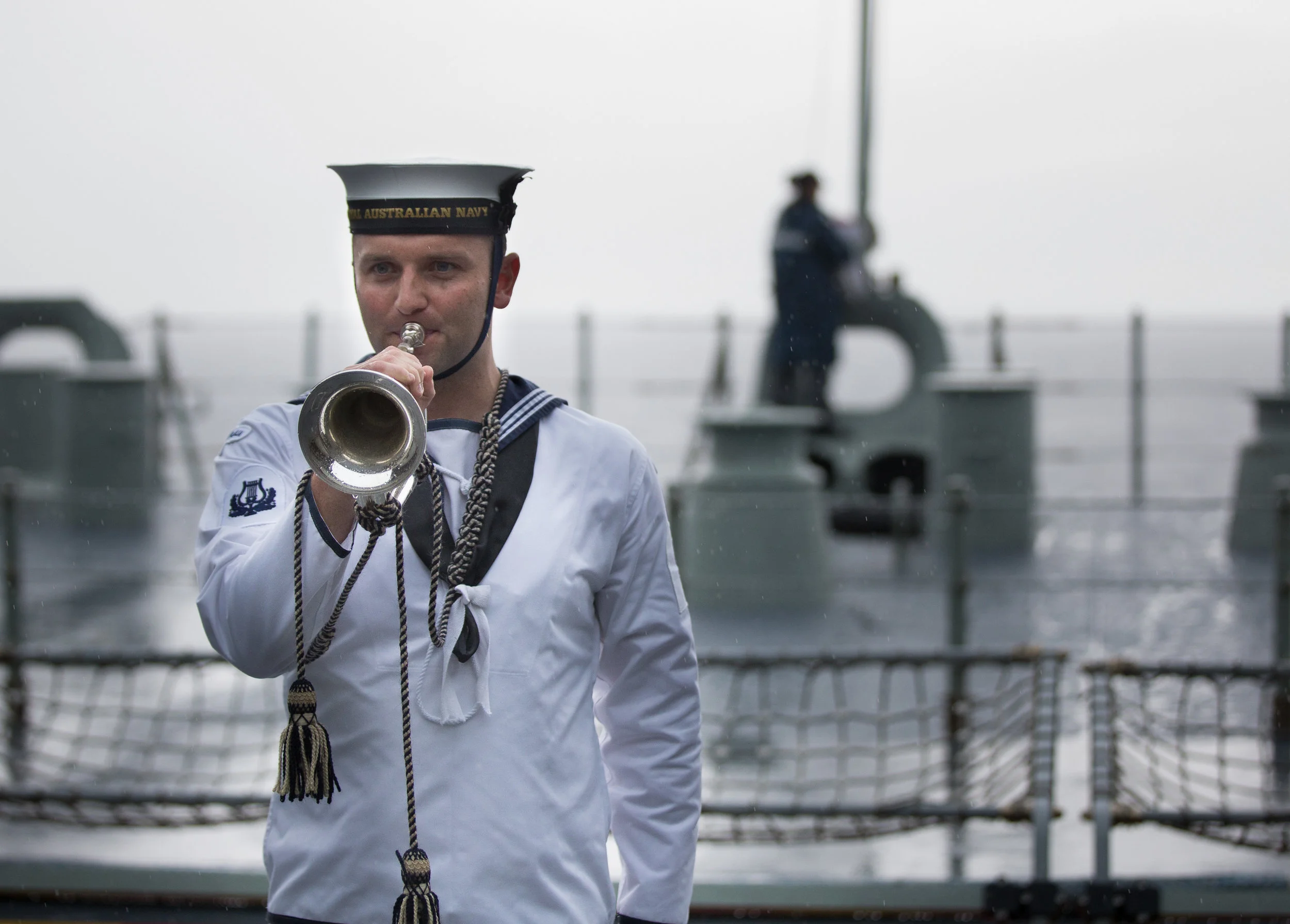 Ben plays the Last Post on HMAS Adelaide 2018
