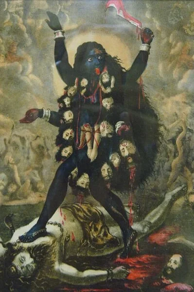 Kali (who signifies the unknown; the un-manifest; death) standing over Shiva. Lithograph, produced by Calcutta Art Studio c. 1908.
